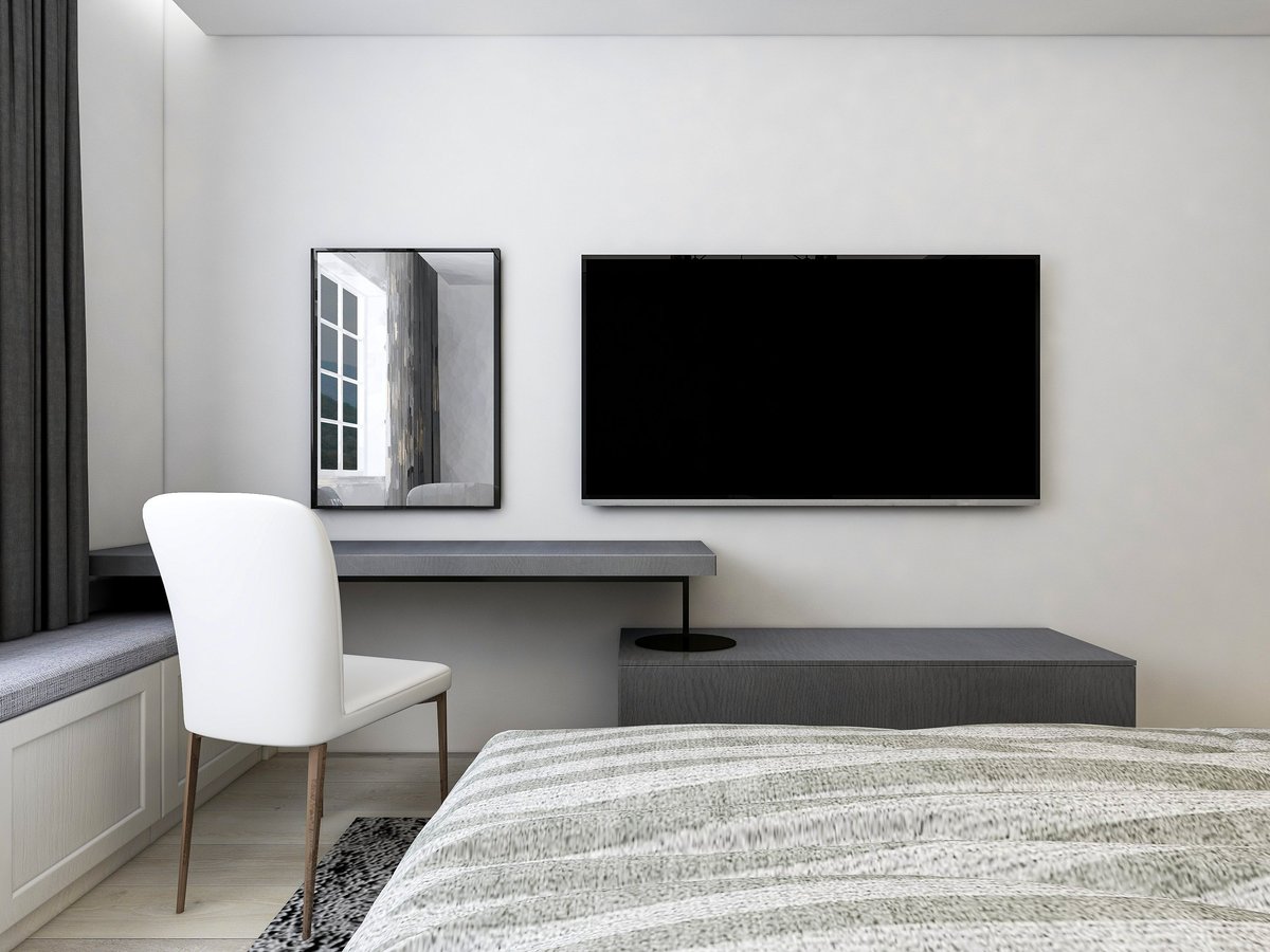 3D rendering, elegant and spacious bedroom design of modern apartment, overcoat cabinet beside the big bed, with dressing table and green plants